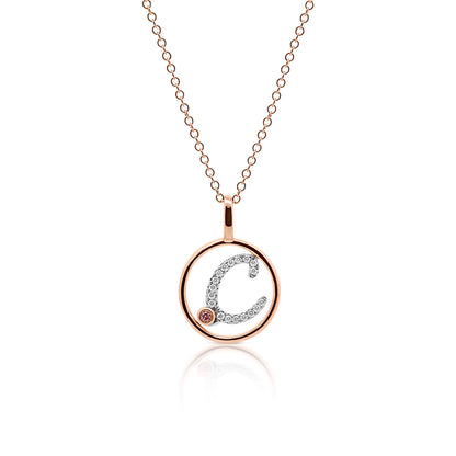 Circle Initial C pendant with pink diamond