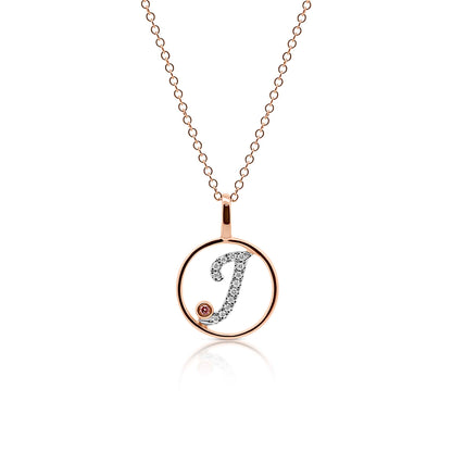 Circle Initial J pendant with pink diamond